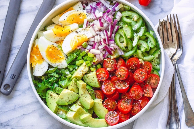 Avocado Salad With Tomato, Eggs, and Cucumber