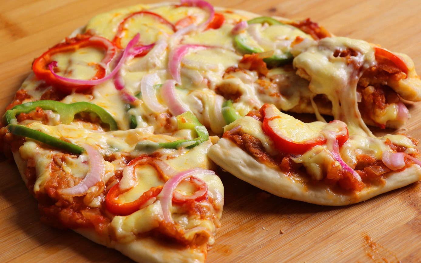 Delicious Homemade Pizza with Peppers and Onions